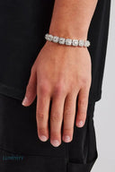 CLUSTERED TENNIS BRACELET - 7MM WHITE GOLD Bracelets