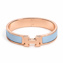 AI-generated illustrative H Gold Bracelet in Baby Blue enamel with Rose Gold finish