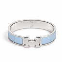 AI-generated illustrative H Gold Bracelet in Baby Blue enamel with Silver finish