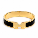 AI-generated illustrative H Gold Bracelet in Black enamel with Gold finish