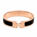 AI-generated illustrative H Gold Bracelet in Black enamel with Rose Gold finish