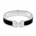 AI-generated illustrative H Gold Bracelet in Black enamel with Silver finish