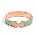 AI-generated illustrative H Gold Bracelet in Green enamel with Rose Gold finish