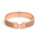 AI-generated illustrative H Gold Bracelet in Light Brown enamel with Rose Gold finish