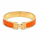 AI-generated illustrative H Gold Bracelet in Orange enamel with Gold finish