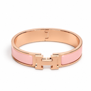 AI-generated illustrative H Gold Bracelet in Pink enamel with Rose Gold finish